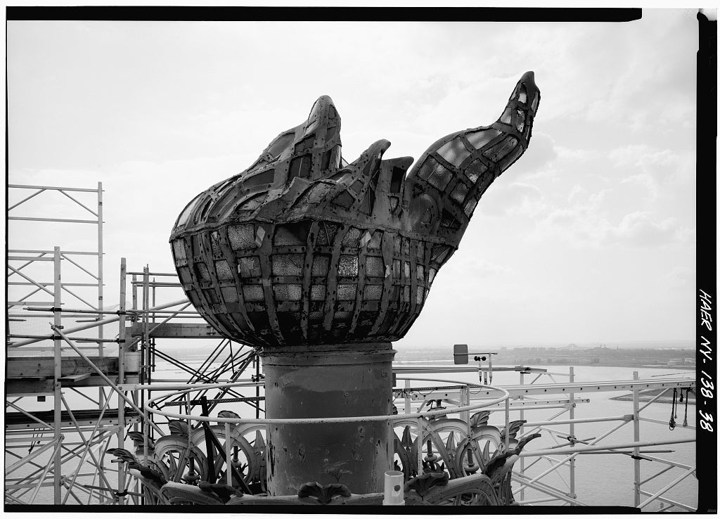 The Statue of Liberty's original torch showing its 1916 glass-panel alterations, photographed during the 1984 restoration. Historic American Engineering Record, Library of Congress.