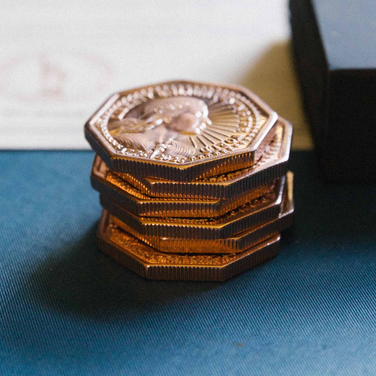A stack of Real Liberty Copper coins struck from authenticated 1886 Statue of Liberty copper.