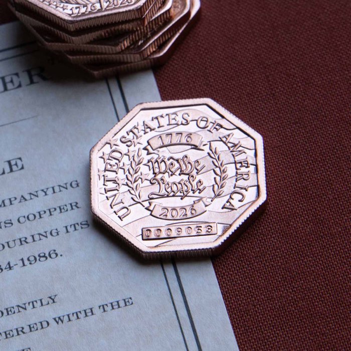 Close-up of a serial number on the coin